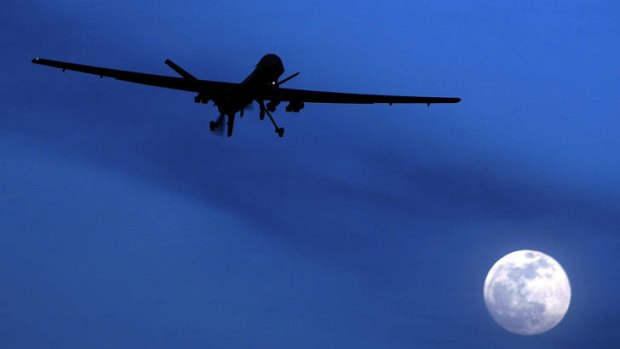 Moonlight shadow ... a US Predator flies over Kandahar in southern Afghanistan.