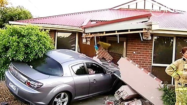 A partially blind woman was lucky to have been in another room when this car crashed through the front of her Altona home.