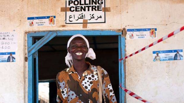 A woman leaves a polling station after voting in Juba.