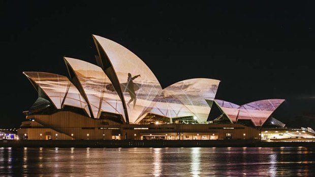 An image is seen on the sails of the Sydney Opera House.