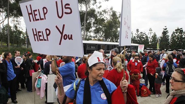 All about numbers: About 2500 union members pushed their case at Sydney Olympic Park.