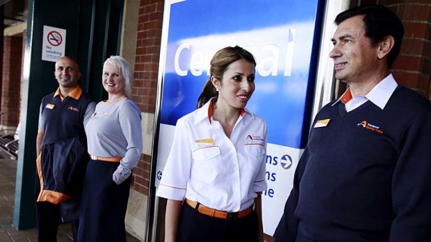 Suited and booted: Sydney Trains staff in new uniforms.