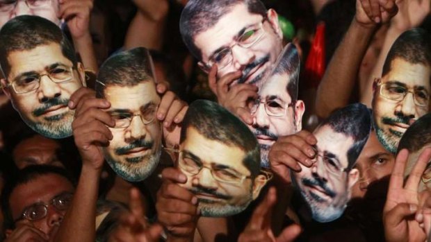 Members of the Muslim Brotherhood and supporters of deposed Egyptian President Mohamed Mursi at a protest in Cairo on July 12, 2013.