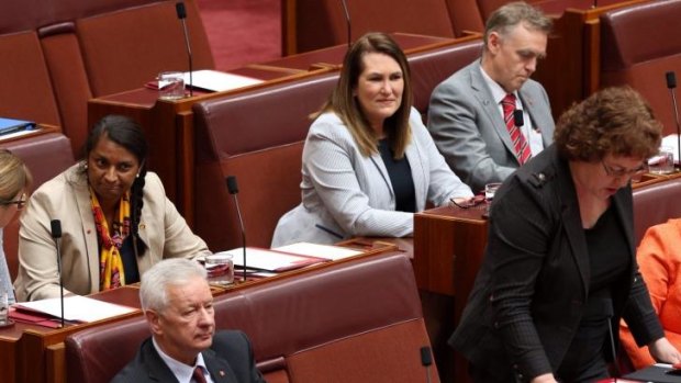 Senator Nova Peris in her first public appearance on Thursday during question time as Senator Jactina Collins asks a question.