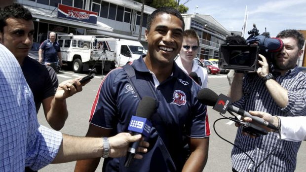 Rooster booster ... Michael Jennings leaves the Roosters' Moore Park HQ after signing with the Bondi Junction club today.