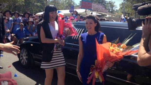 Dami Im and Dannii Minogue arrive together at Ms Im's old school John Paul College last year.