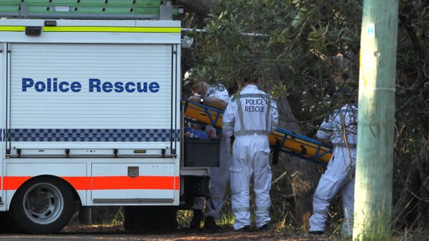 Police rescue crews arrive at the scene in the Blue Mountains where the body was discovered.