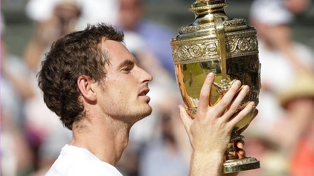 77 years in the making ... Andy Murray grasps the Wimbledon trophy.