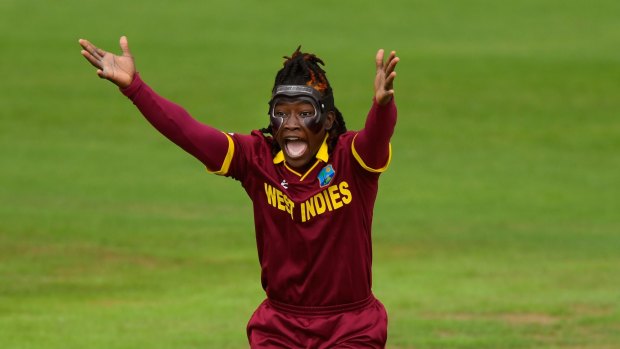 TAUNTON, ENGLAND - JUNE 26: A masked Deandra Dottin appeals for a wicket during the ICC Women's World Cup 2017 match between Australia and West Indies at The Cooper Associates County Ground on June 26, 2017 in Taunton, England. (Photo by Stu Forster/Getty Images)