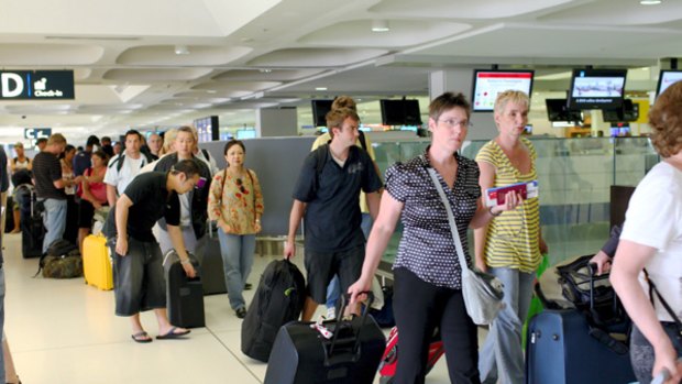 Take a number ... the queue of disgruntled air travellers is growing longer.