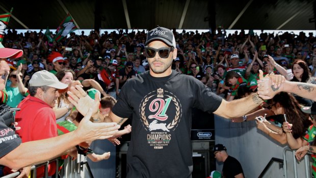 Conquering hero: Greg Inglis greets the fans on Monday.