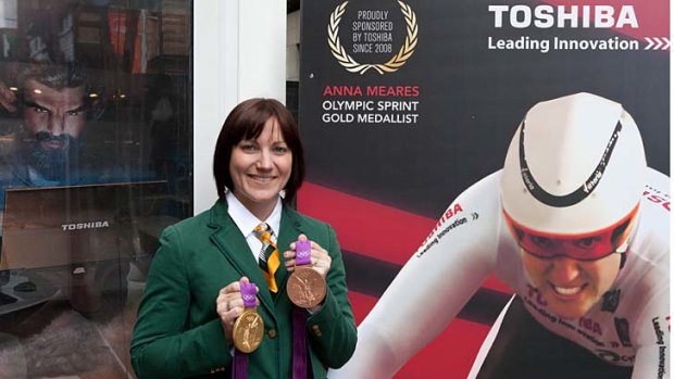 Anna Meares poses with her London Olympic medals.