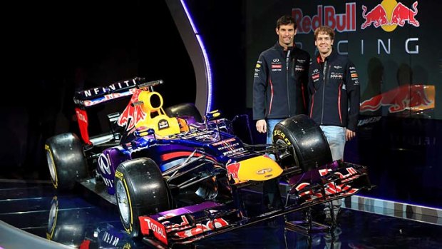 Mark Webber and Sebastian Vettel with the new Red Bull car.