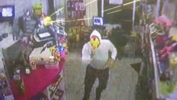 The man, hiding his face with an Iron Man mask, was captured on CCTV at a convenience store.