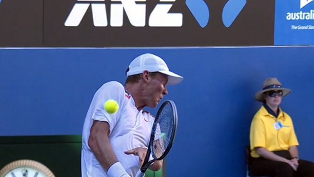 Tomas Berdych is hit in the elbow by a ball returned at him by Nicolas Almagro.
