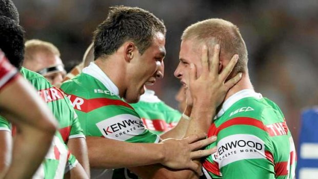 Gang of four: George Burgess (right) has joined brother Sam (left), Luke and Tom in committing to the Rabbitohs.