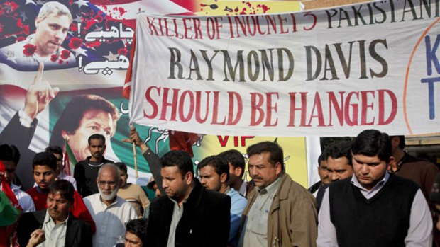 Seeking revenge: Protesters from the political party Tehreek-e-Insaf demand the death penalty for US official Raymond Davis over the deaths of two Pakistanis.