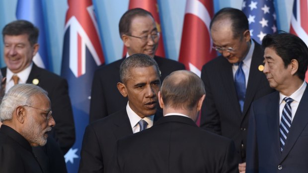 President Barack Obama greets Russia's President Vladimir Putin at the G20 summit in Antalya, Turkey on Sunday.