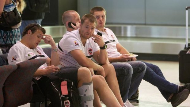 No comment ... dejected Dragons players return to Sydney after their heart-breaing loss to the Broncos.