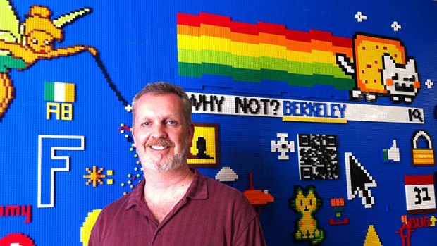 Searching for answers ... Lars Rasmussen in front of the Lego wall at Facebook's headquarters.