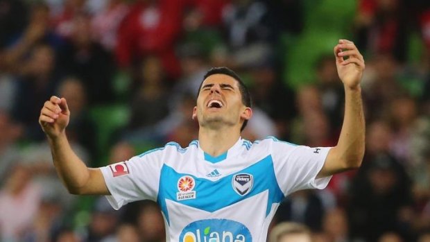 Tomas Rogic of Melbourne Victory reacts after missing a shot at goal during the round 21 A-League match against  Melbourne Heart at AAMI Park on March 1, 2014.
