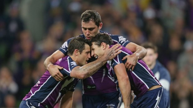 The ‘‘Big Three’’ of Cooper Cronk (left), Cameron Smith and Billy Slater;