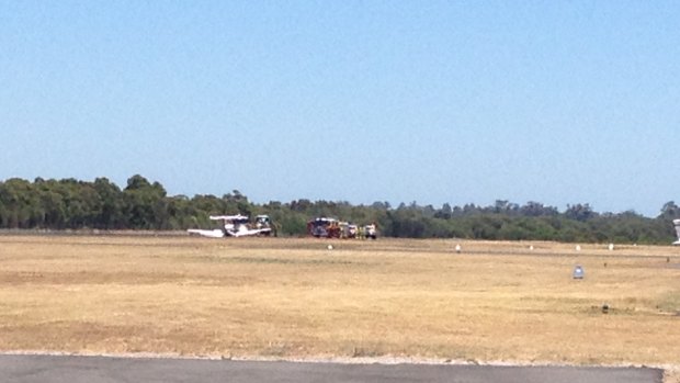 The light plane landed safely, without injury to passenger or pilot.