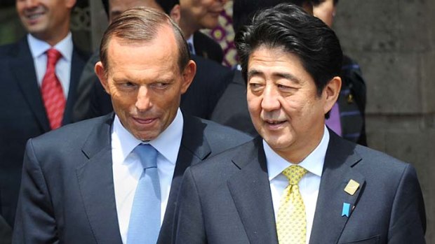 Talks between the two leaders were "exceptionally warm": Australia's Prime Minister Tony Abbott and Japan's Prime Minister Shinzo Abe.