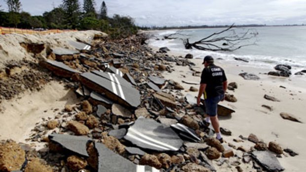 John Purnell inspects the damage to Kingscliff Beach on the north coast ... "You're looking at a good 100 metres just destroyed by nature."