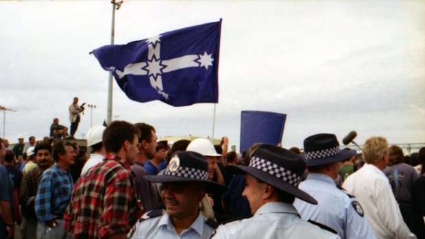Police and protesters mingle at Webb Dock, Melbourne. April 8, 1998.