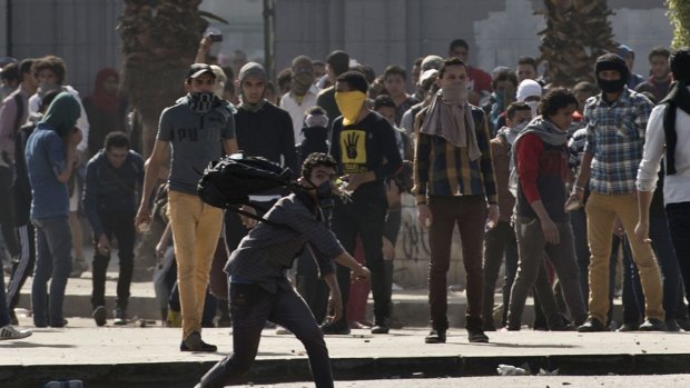 Egyptian students who support the Muslim Brotherhood following a demonstration outside Cairo University last year. 