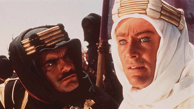 Peter O’Toole (right) as adventurer T.E. Lawrence in <i>Lawrence of Arabia</i>.