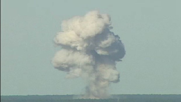 A rising mushroom cloud from a MOAB, from an Air Force video.