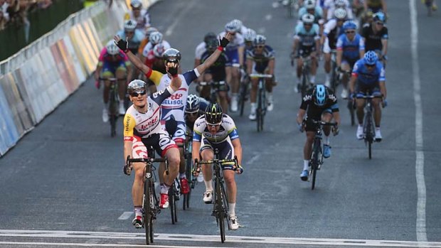 Lotto-Belisol's Andre Greipel (left) of Germany crosses the line ahead of Australia's Matthew Goss (right) from GreenEdge in the People's Choice Classic prior to the Tour Down Under in Adelaide.