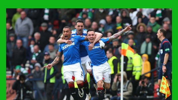Barrie McKay, right, of Rangers celebrates with his teammates after scoring their second goal.