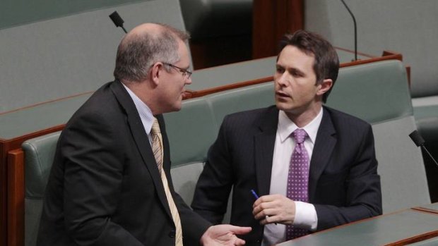 Home Affairs Minister Jason Clare (R) seen here with Shadow Immigration Minister Scott Morrison (L) in Parliament last month.