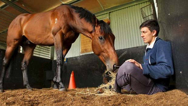 Derby ace: Hvasstan and Michael Gelagotis, the son of trainer Peter Gelagotis, at their Moe stables.