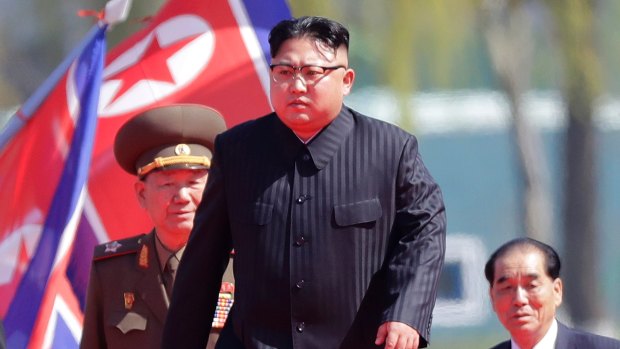 North Korean leader Kim Jong-un, centre, has consumed world attention with his regime's recent missile launches.