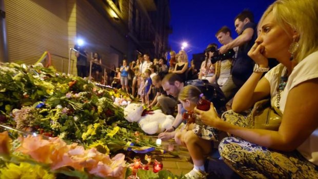 Candles and flowers at the Netherlands Embassy in Kiev.