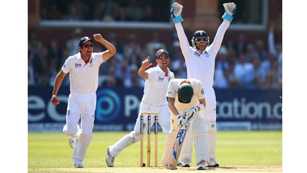 England's Alastair Cook, Jonathan Trott and Matt Prior appeal after Michael Clarke got a nick to a ball from Joe Root that carried to Cook at leg-slip.