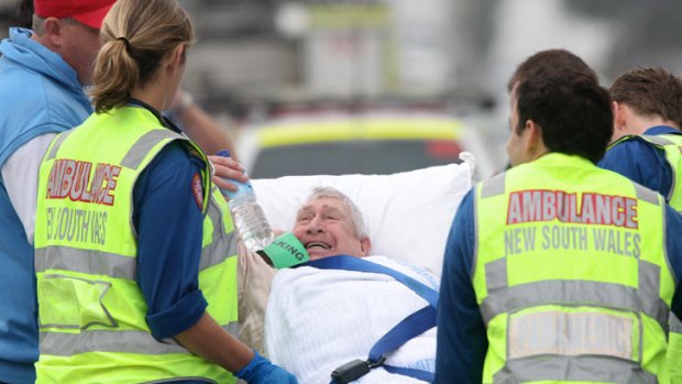 Anguish shows on the face of a resident after being evacuated from the nursing home.