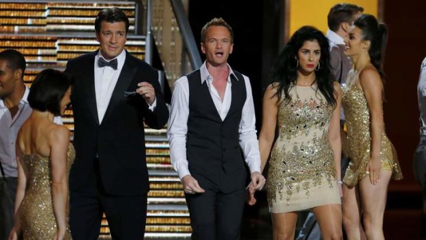 Not necessarily a crowd-pleaser ... (from left) Nathan Fillion, Neil Patrick Harris and Sarah Silverman perform a musical number at the 65th Primetime Emmy Awards.