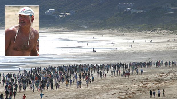 Along the beach where Tim Gates (inset) surfed and died, the crowd honoured his memory on Saturday with his family.