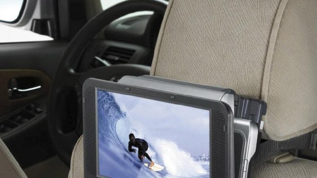 After-market Panasonic DVD player by attached to a car seat