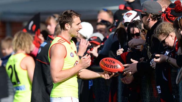 Words are fine: Jobe Watson mixes with fans on Saturday.