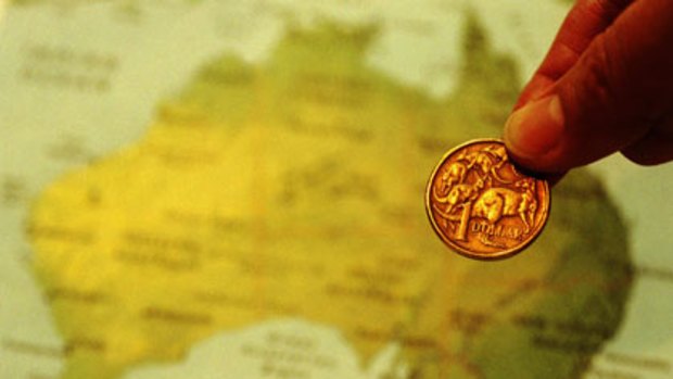 The Aussie dollar has climbed back above parity with the greenback.