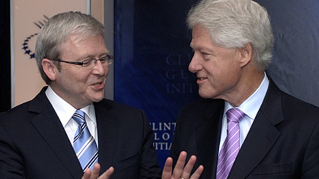 Heading to Brisbane ... Queensland will pay host to former US President Bill Clinton, pictured with Prime Minister Kevin Rudd, in November.