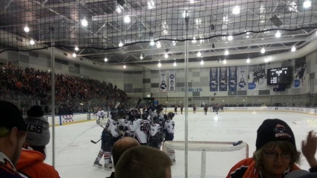 Melbourne Ice celebrates its 5-1 derby victory over the Mustangs.