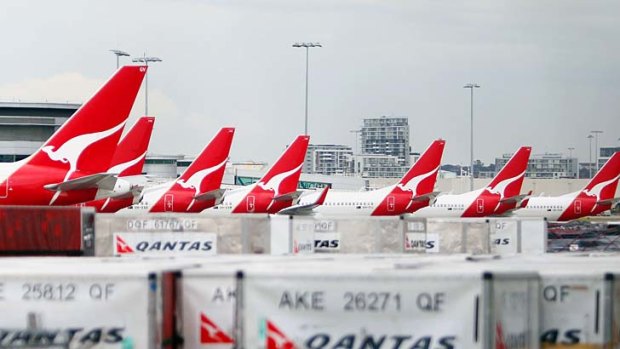 Qantas airplanes lined up at Sydney airport in October 2011, after Qantas grounded its entire fleet as a result of industrial action.