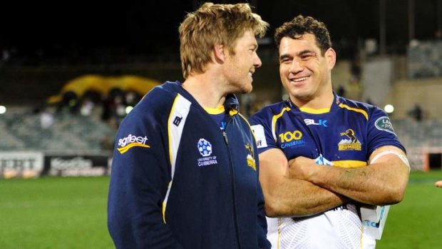Clyde Rathbone and George Smith celebrate the Brumbies win last weekend over the Cheetahs.